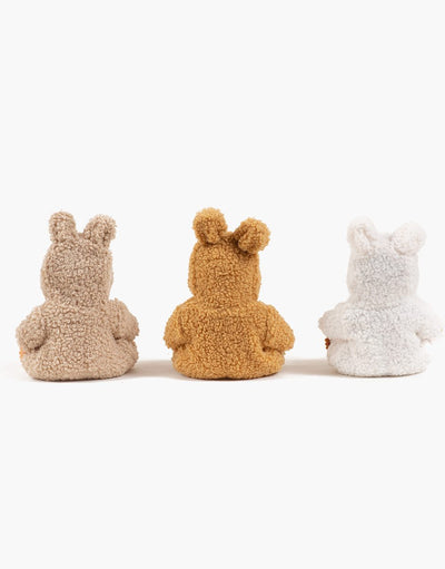 Guillo, Peque doll in camel-colored terrycloth Winnie the Pooh jumpsuit