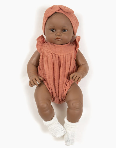 Augustine dressed in her marsala cotton gauze romper