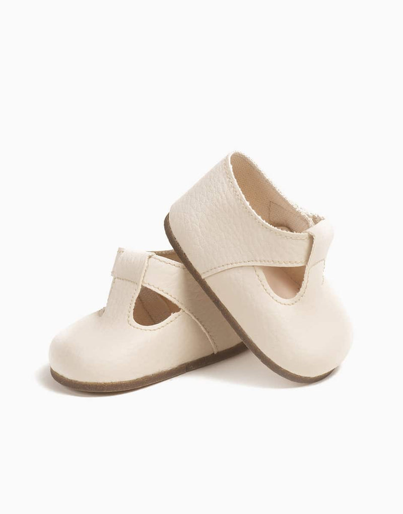 Bambinis – Pair of cream “T-strap” shoes