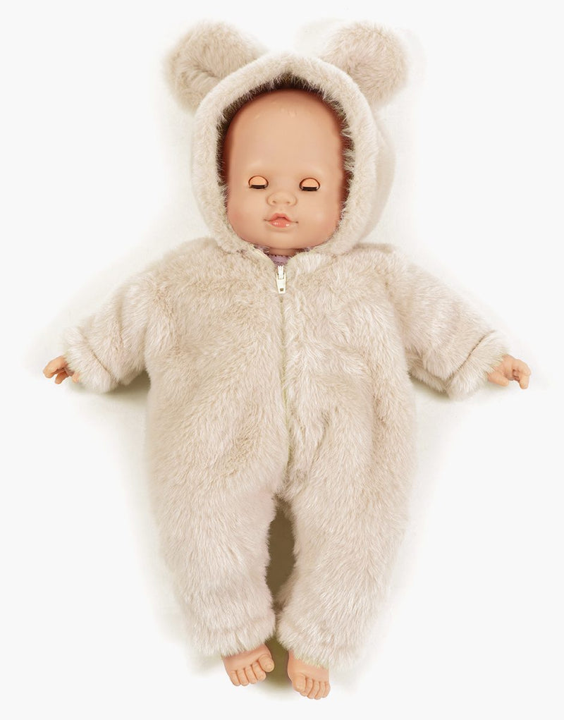 Emilie with sleeping eyes, in ecru faux fur Winnie the Pooh jumpsuit