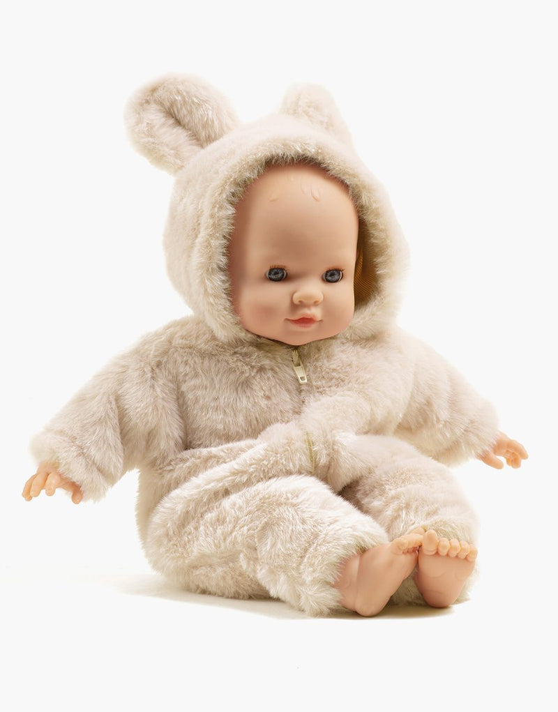 Emilie with sleeping eyes, in ecru faux fur Winnie the Pooh jumpsuit