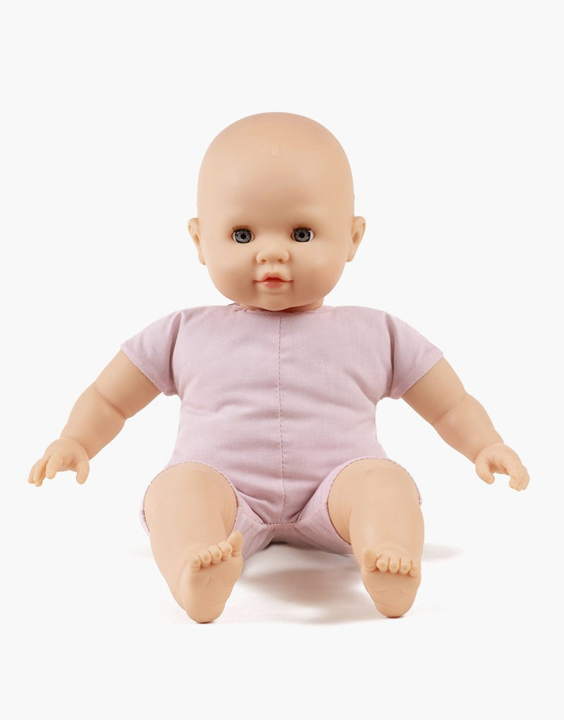 Emilie with sleeping eyes, in pink faux fur Winnie the Pooh jumpsuit