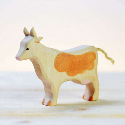 White and Brown Cow