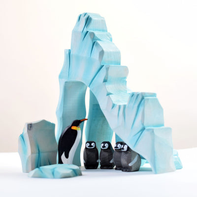 Icy Cliffs with Large Penguin Family